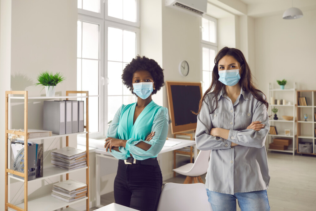 return to office, employees, mask, image by Adobe stock