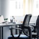 REturn to office, empty work space, office chair, image by Adobe stock
